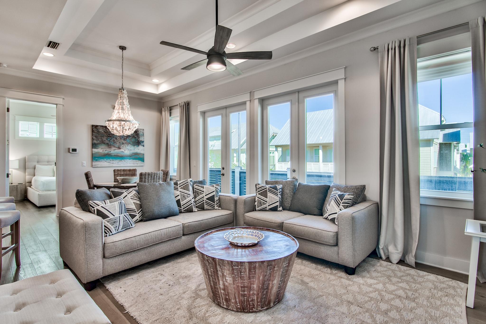33 Milestone Dr Inlet Beach, Unit C Inlet Beach, FL 32461 - Photo 2 of 24 a living room with furniture and a large window
