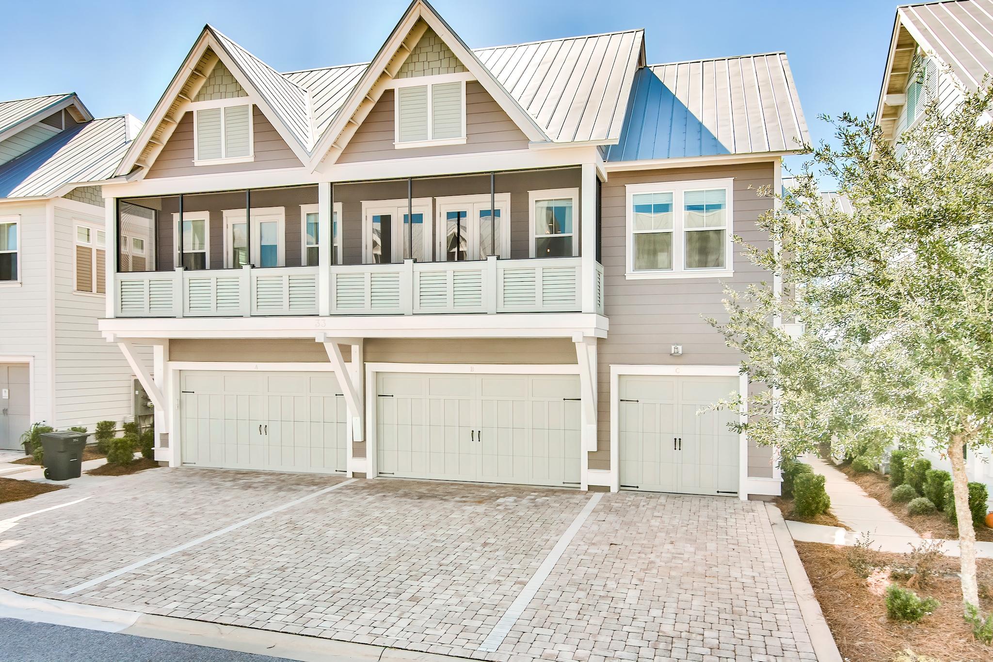 33 Milestone Dr Inlet Beach, Unit C Inlet Beach, FL 32461 - Photo 21 of 24 front view of a house with a yard