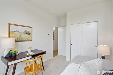 a bedroom with furniture and a bed