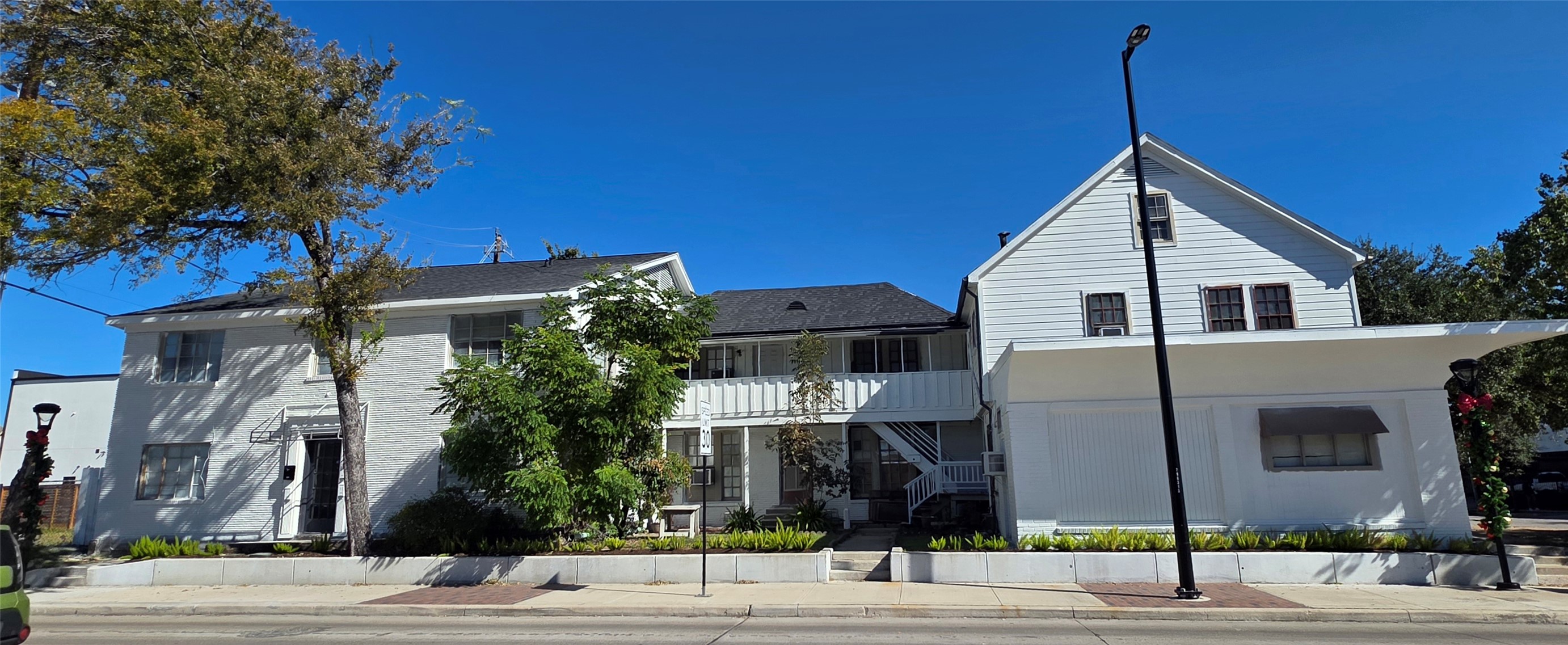 a view of a house with a street