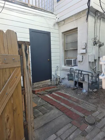 a bathroom with a sink a mirror and shower