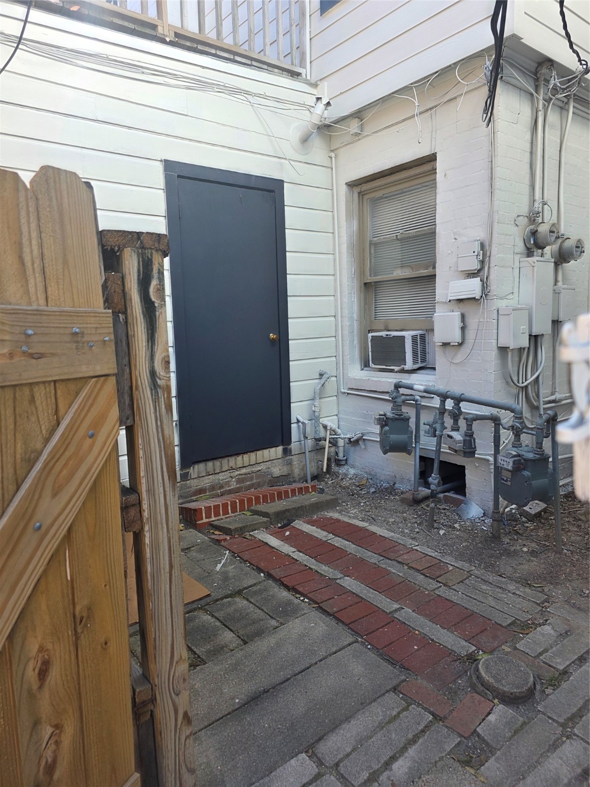 3817 South Shepherd Drive, Unit 2 Houston, TX 77098 - Photo 11 of 11 a bathroom with a sink a mirror and shower