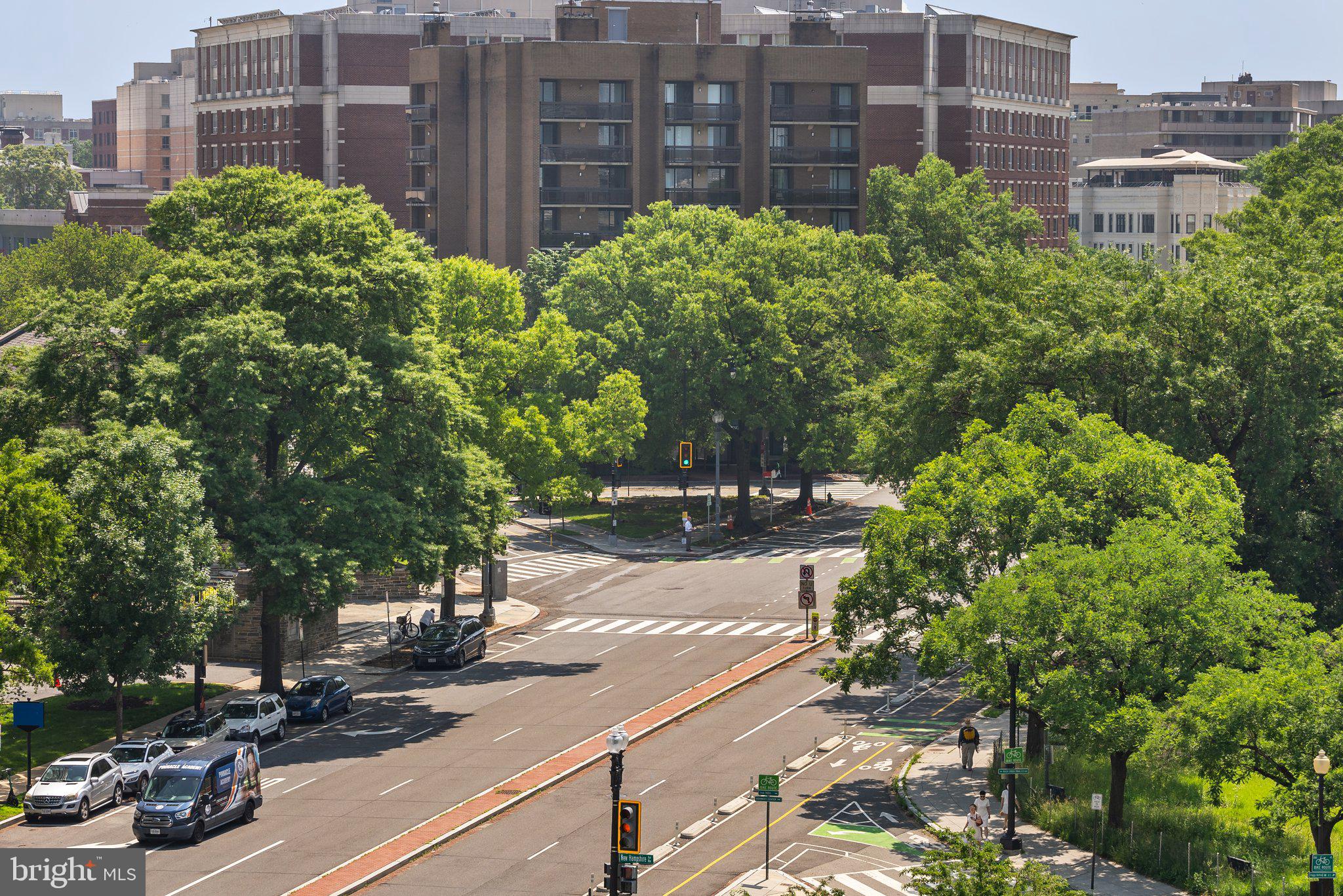 2500 Virginia Avenue Northwest, Unit 906S Washington, DC 20037 - Photo 25 of 39 a view of a street with a building and trees in the background