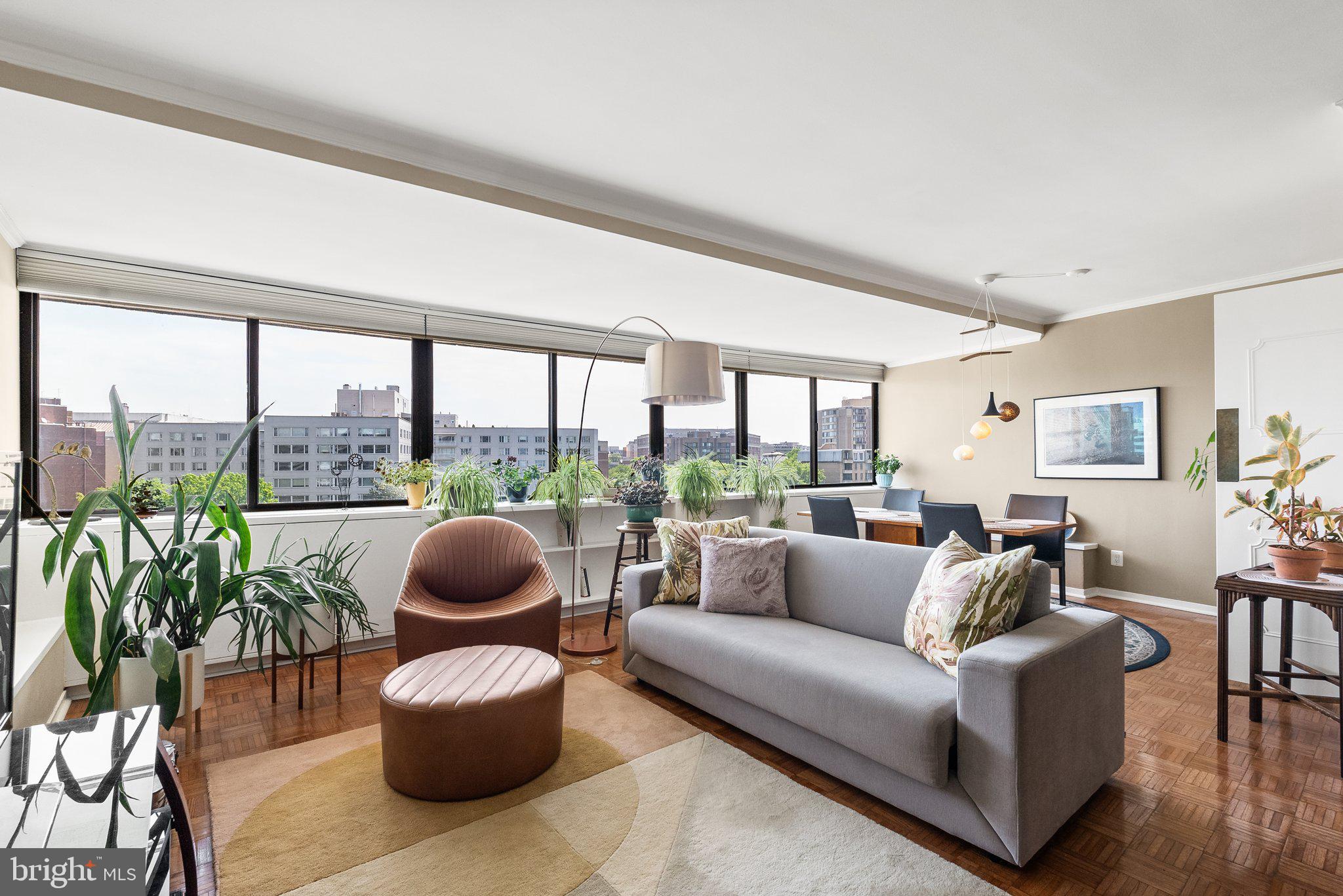 2500 Virginia Avenue Northwest, Unit 906S Washington, DC 20037 - Photo 3 of 39 a living room with furniture and a large window