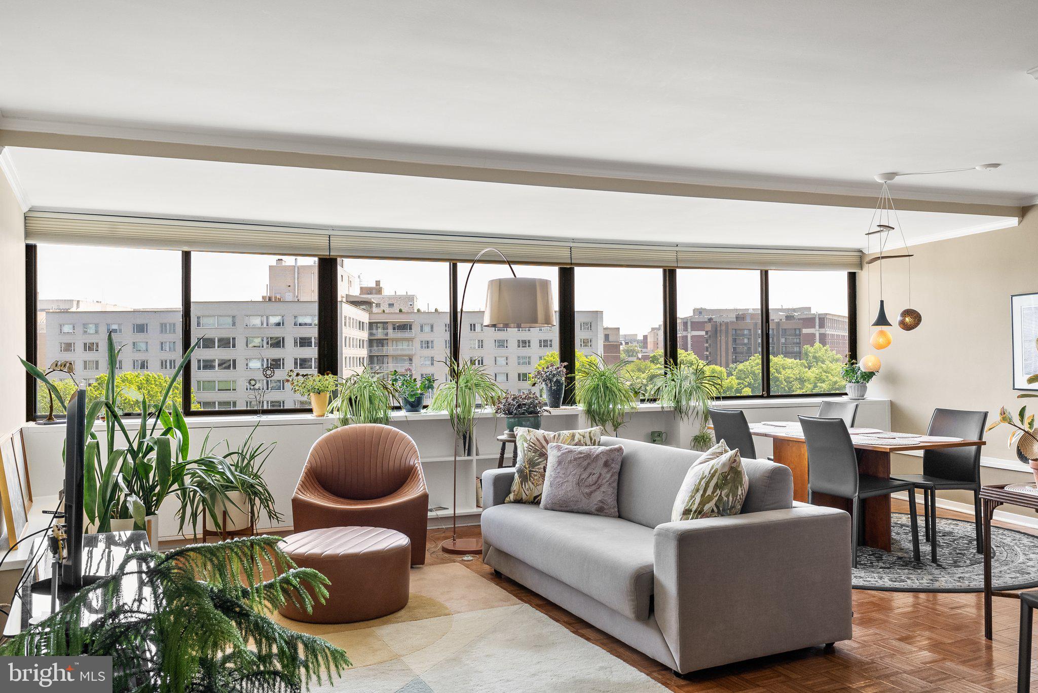 2500 Virginia Avenue Northwest, Unit 906S Washington, DC 20037 - Photo 5 of 39 a living room with furniture and a large window