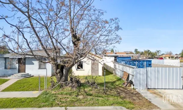 an aerial view of a house with a lake view