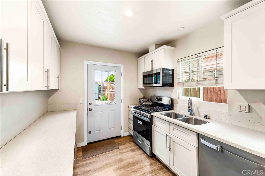 1301 West 132nd Street Compton, CA 90222 - Photo 5 of 17 Kitchen
(Digitally altered)