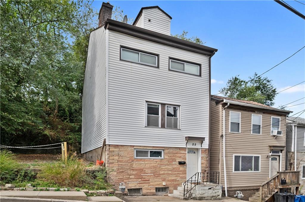 22 Eleanor Street Pittsburgh, PA 15203 - Photo 2 of 36 a view of a house with a yard