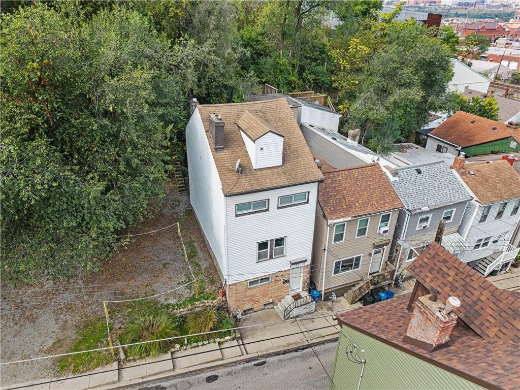 22 Eleanor Street Pittsburgh, PA 15203 - Photo 25 of 36 an aerial view of a house with swimming pool