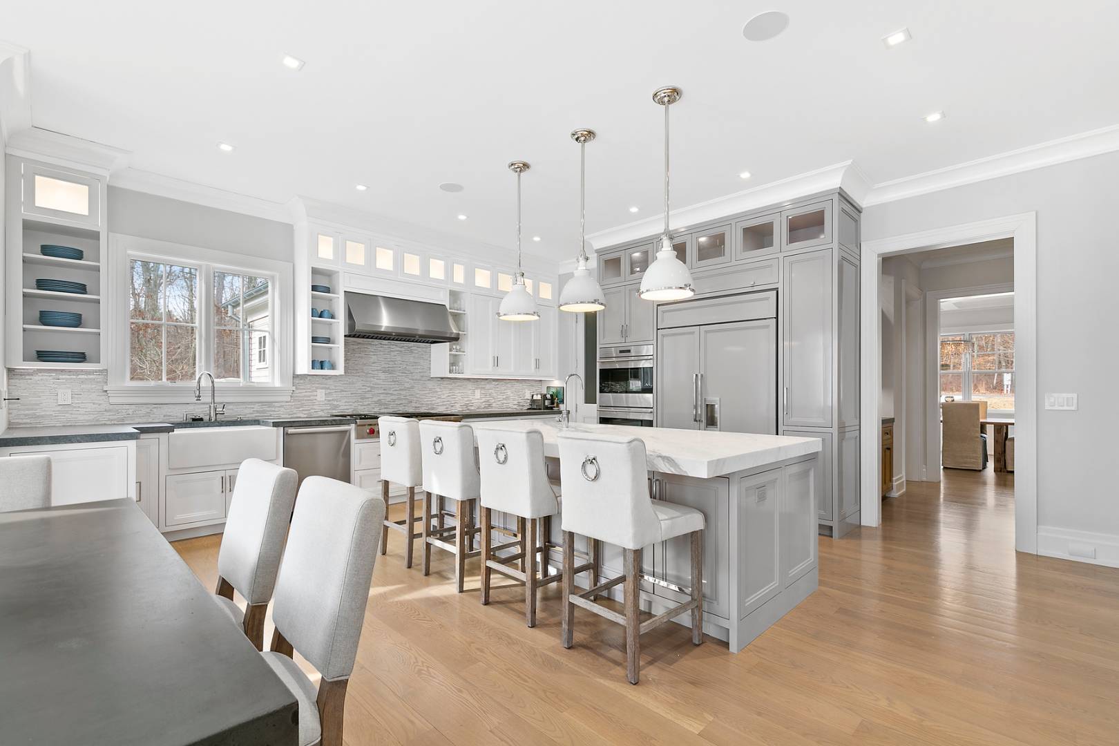 2 Frazier Avenue Southampton, NY 11968 - Photo 5 of 12 a large kitchen with a table and chairs