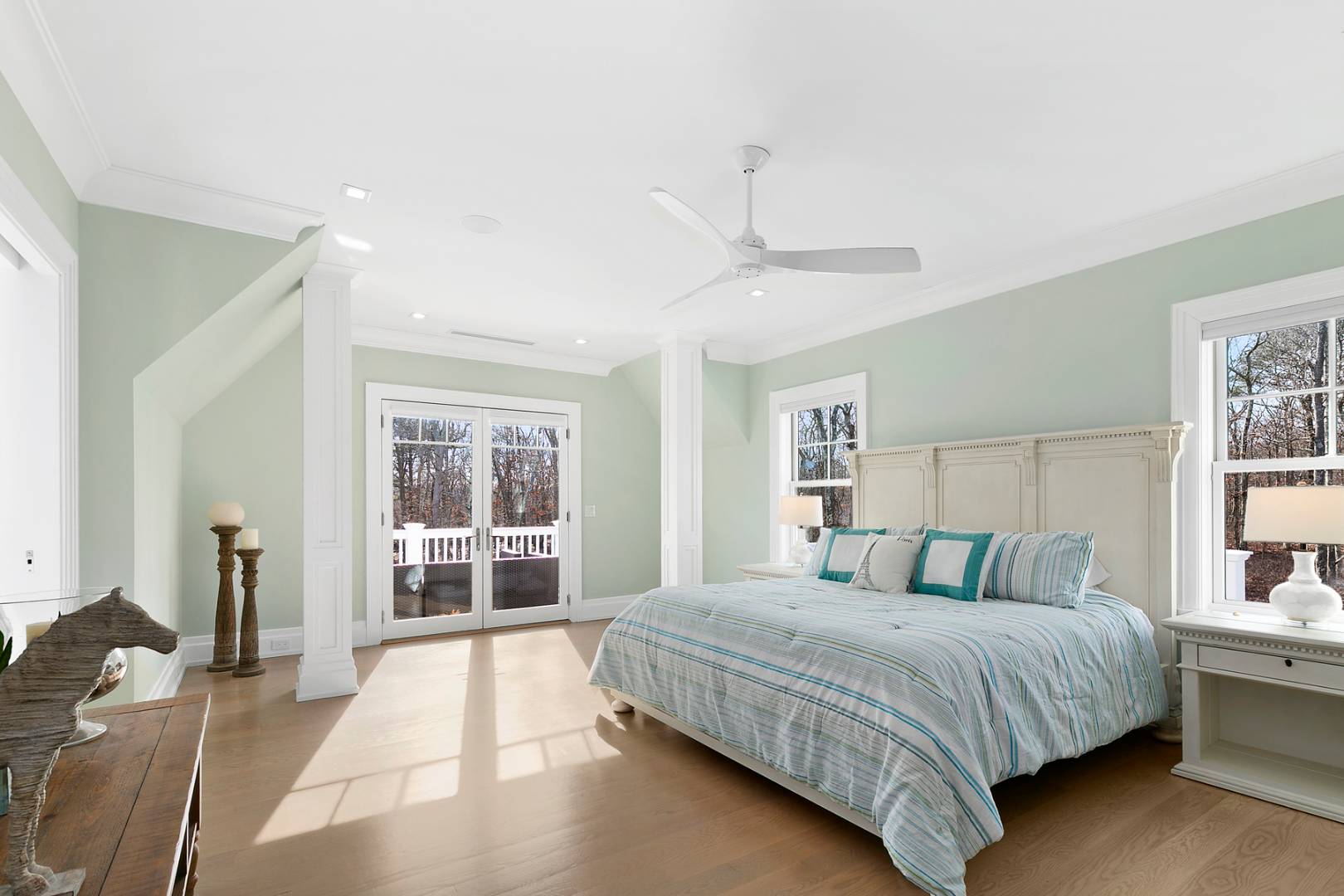 2 Frazier Avenue Southampton, NY 11968 - Photo 6 of 12 a bedroom with a large bed and a window