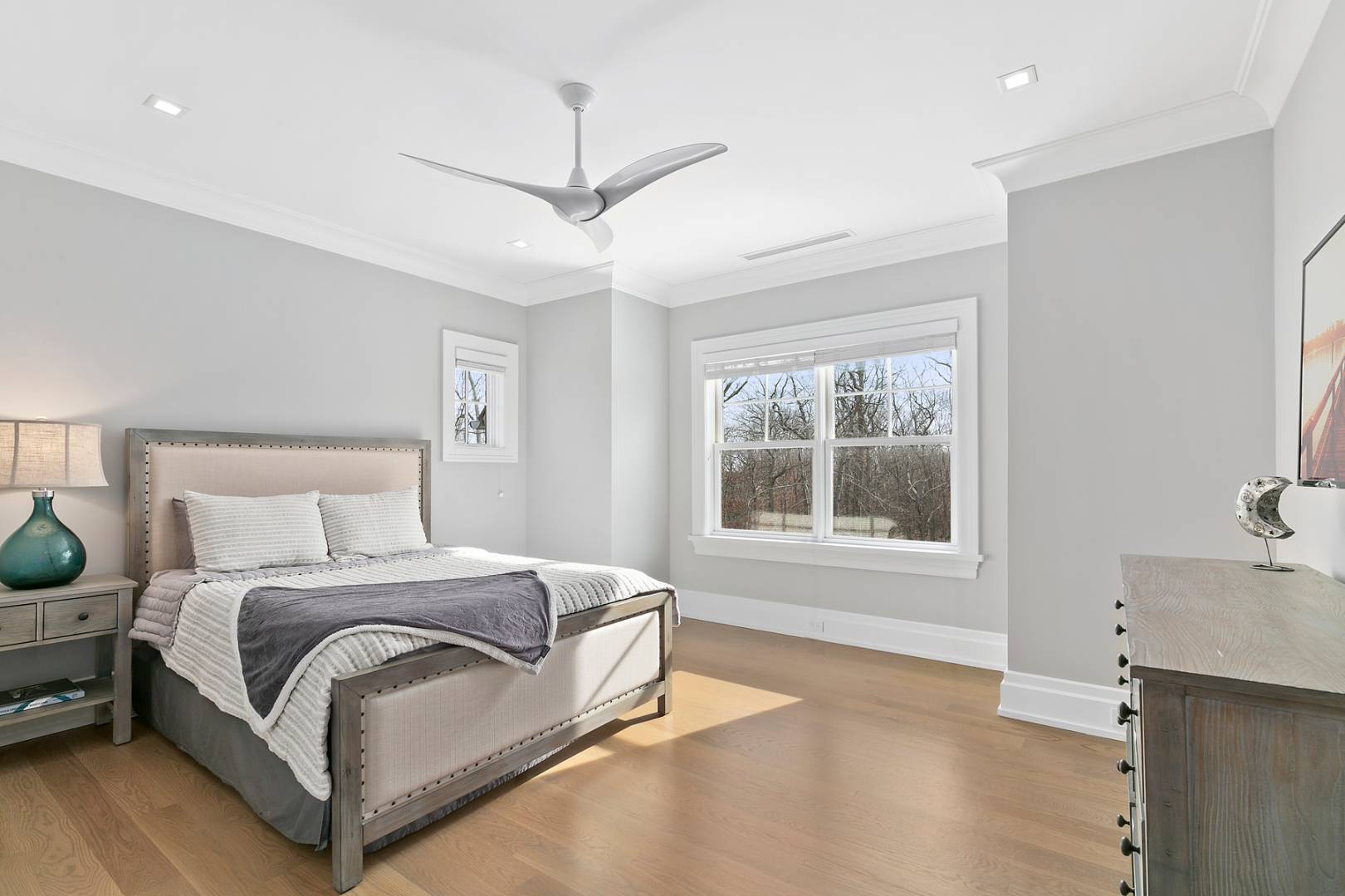 2 Frazier Avenue Southampton, NY 11968 - Photo 10 of 12 a bedroom with a large bed and a window