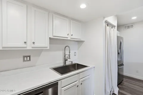 a kitchen with a stove and a microwave