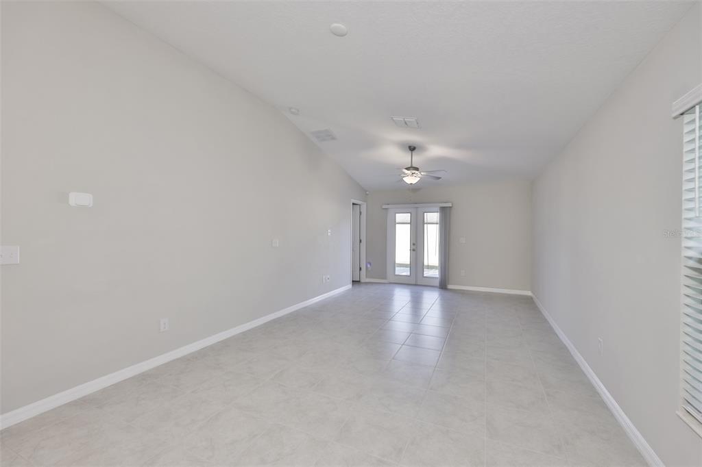 31867 Barrel Wave Way Wesley Chapel, FL 33545 - Photo 11 of 45 a view of an empty room with a window