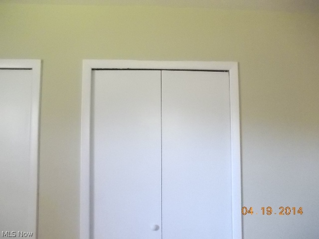 783 Edgewood Road Cleveland, OH 44143 - Photo 12 of 22 The third bedroom showing off brand new closet doors.