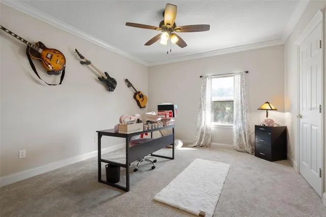 a view of a living room with hardwood floor