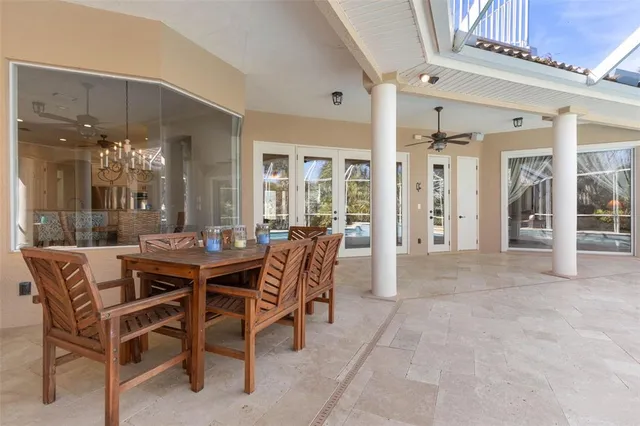 a view of a wooden bridge next to a lake