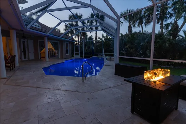 an aerial view of residential houses and outdoor space