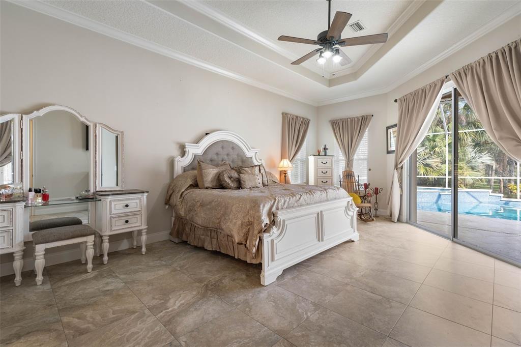 67 Island Estates Parkway Palm Coast, FL 32137 - Photo 10 of 84 a living room with furniture and a large window