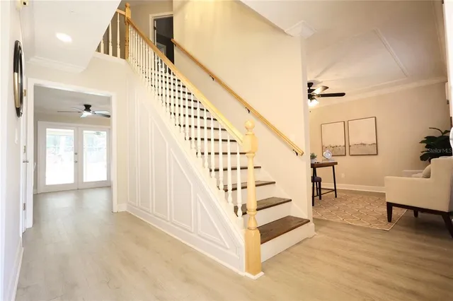 a view of entryway with wooden floor