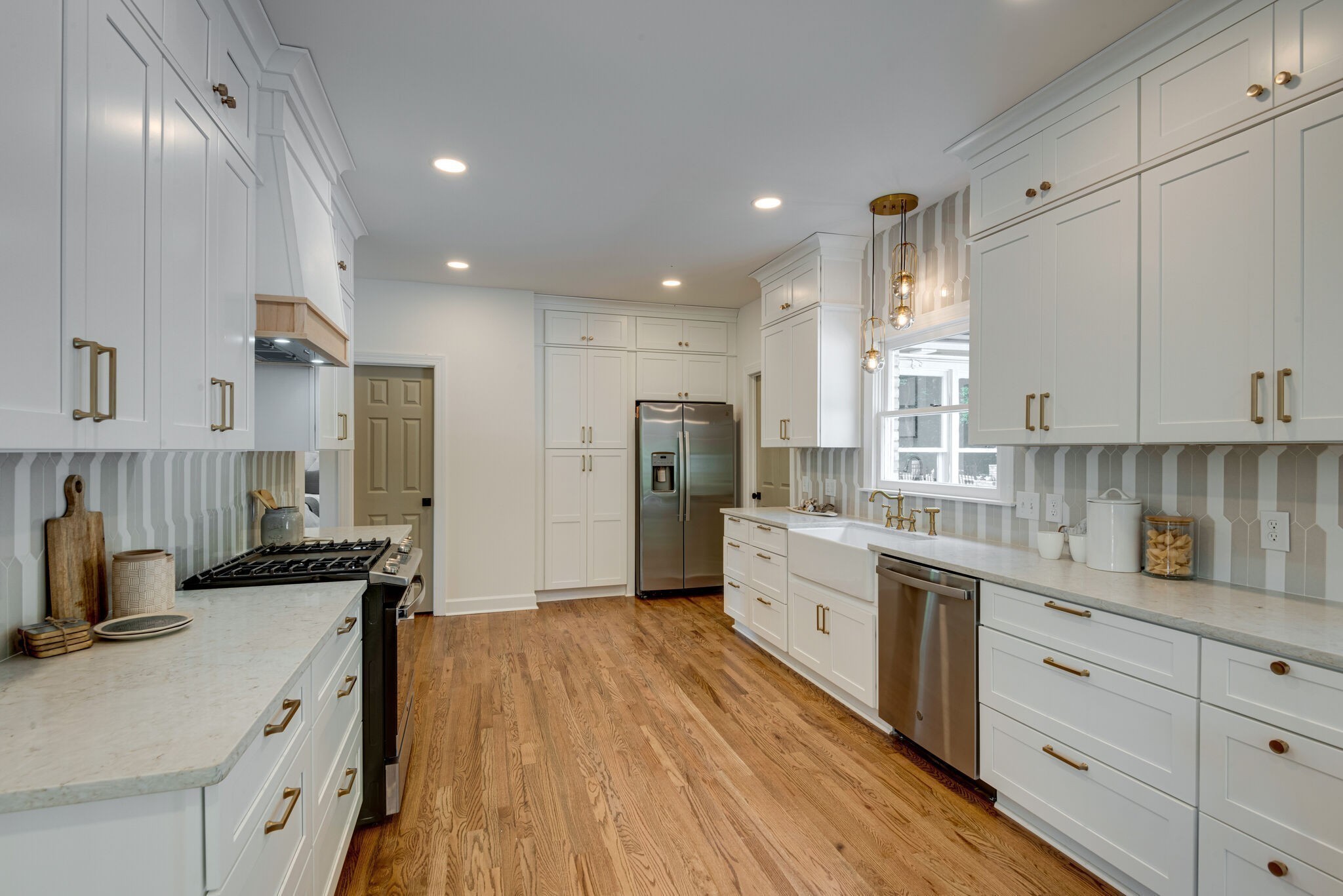 325 East Piney Road Dickson, TN 37055 - Photo 21 of 63 a kitchen with stainless steel appliances granite countertop a sink stove and refrigerator