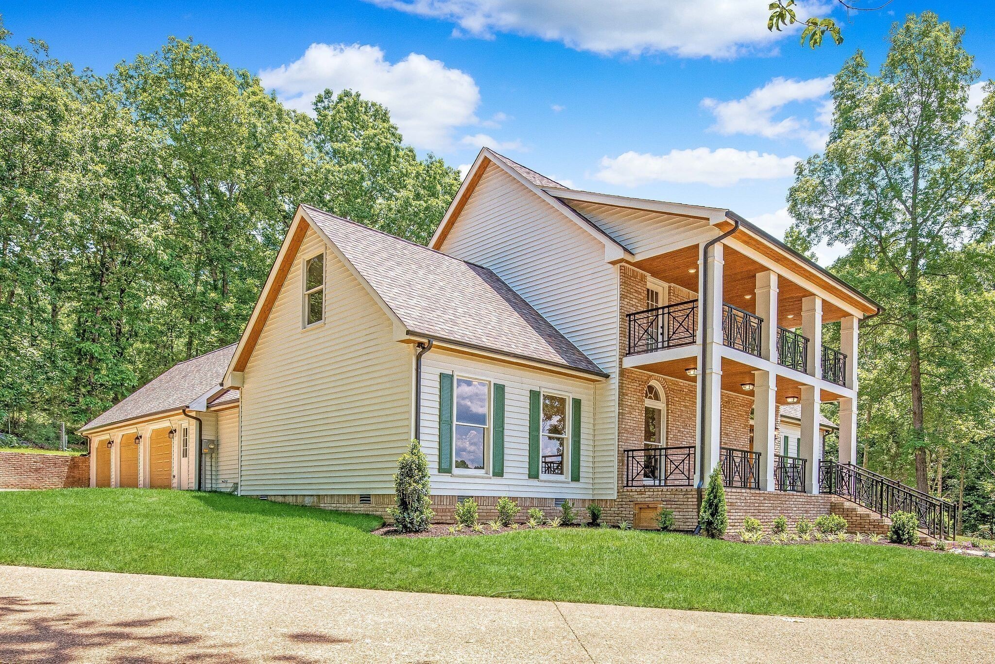 325 East Piney Road Dickson, TN 37055 - Photo 52 of 63 a view of a yard in front of a house with plants and large tree