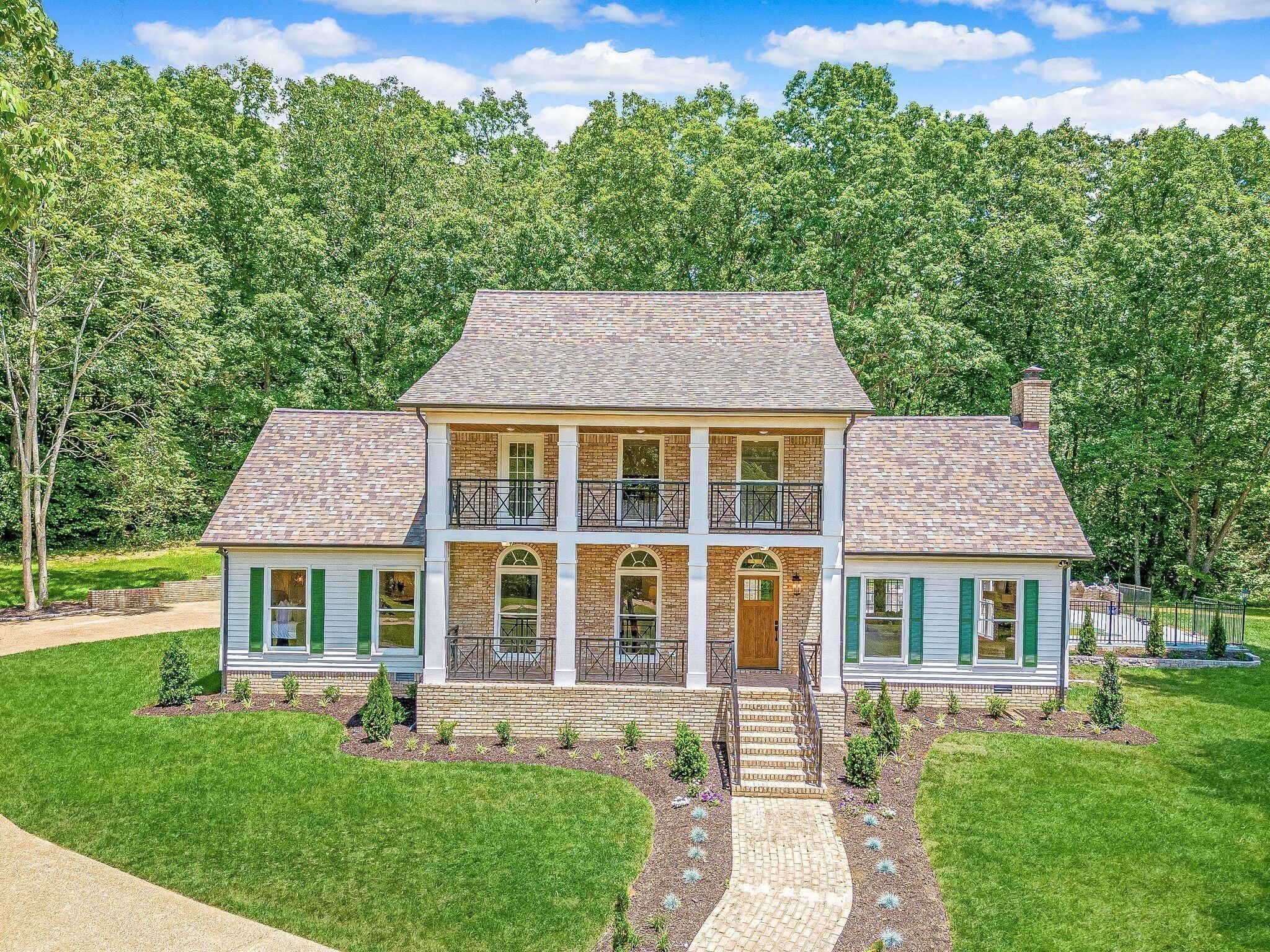 325 East Piney Road Dickson, TN 37055 - Photo 56 of 63 a front view of a house with a yard