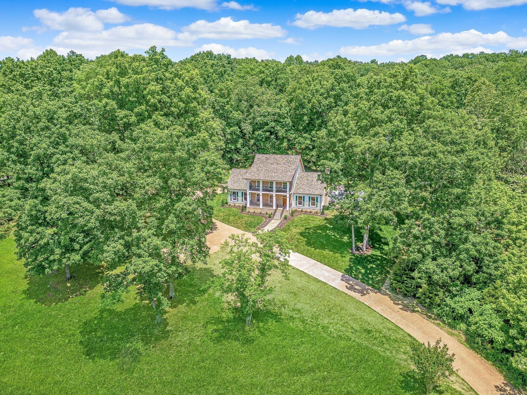 325 East Piney Road Dickson, TN 37055 - Photo 60 of 63 a view of a lush green field