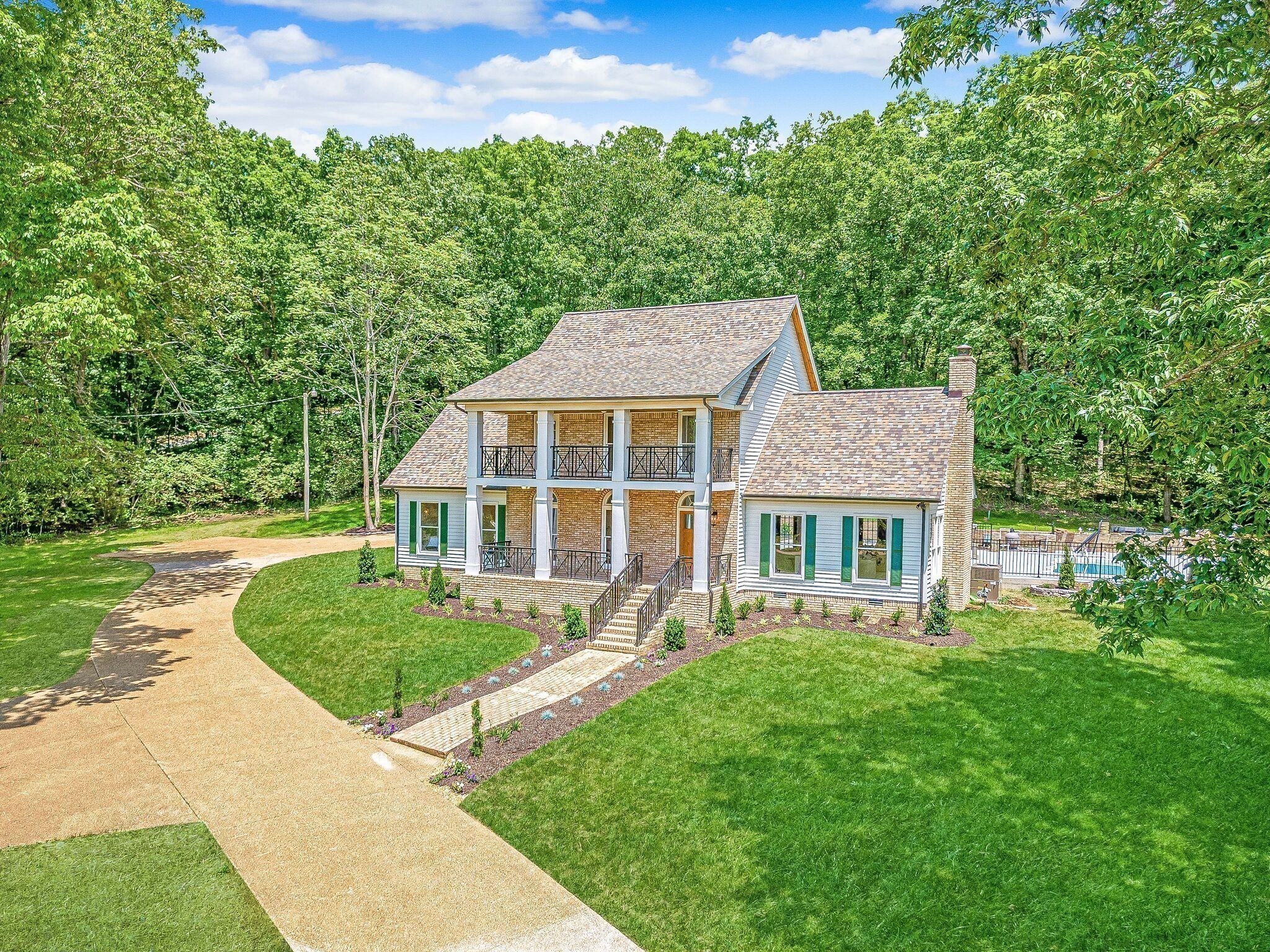 325 East Piney Road Dickson, TN 37055 - Photo 61 of 63 front view of a house with a yard