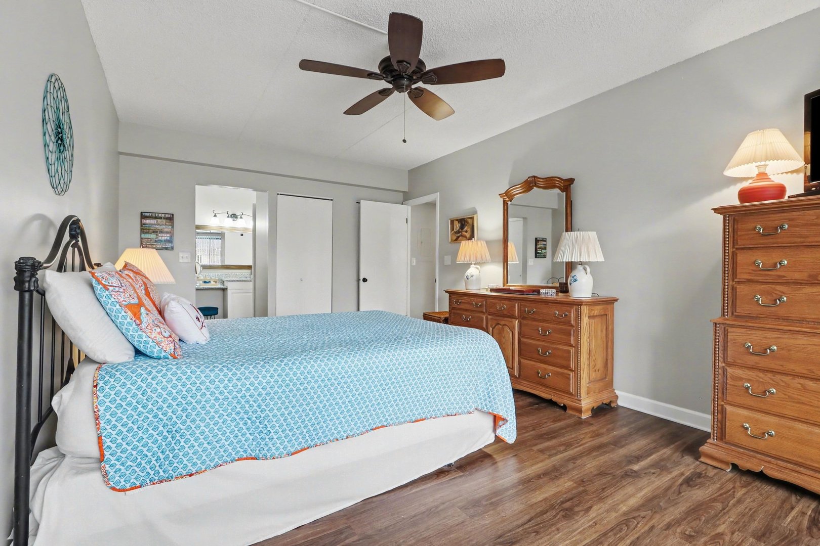 1423 Woodbridge Road, Unit 1E Joliet, IL 60436 - Photo 11 of 30 a bedroom with a bed and a dresser