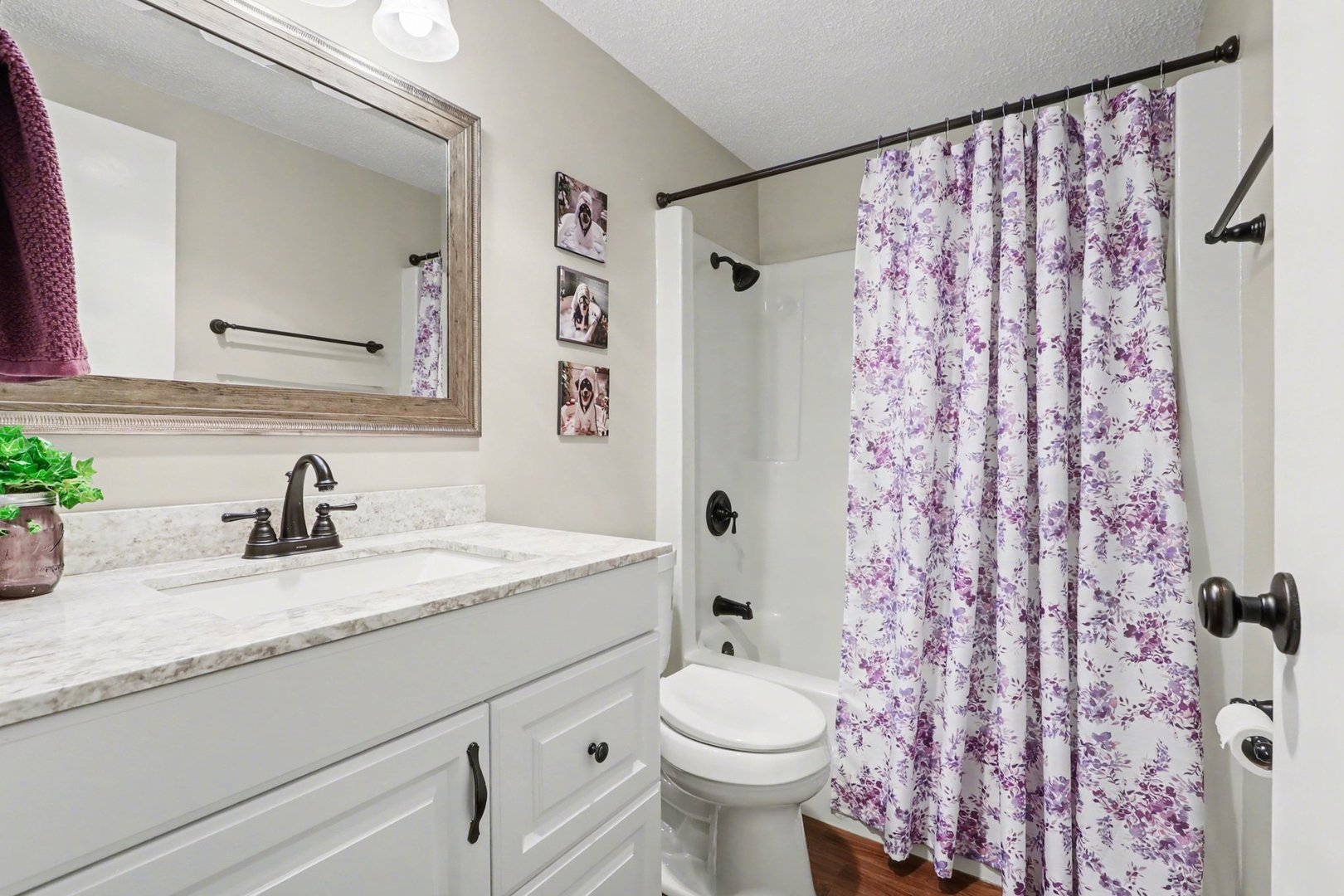 1423 Woodbridge Road, Unit 1E Joliet, IL 60436 - Photo 15 of 30 a bathroom with a granite countertop sink and a mirror