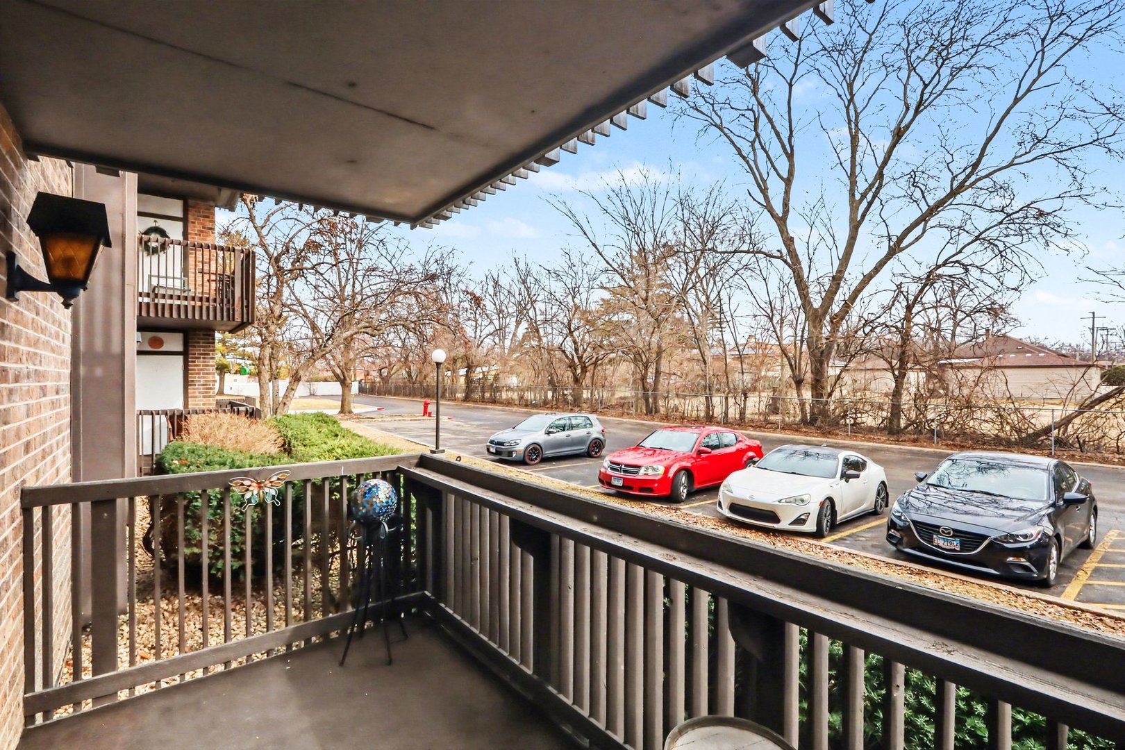 1423 Woodbridge Road, Unit 1E Joliet, IL 60436 - Photo 18 of 30 a view of street from balcony
