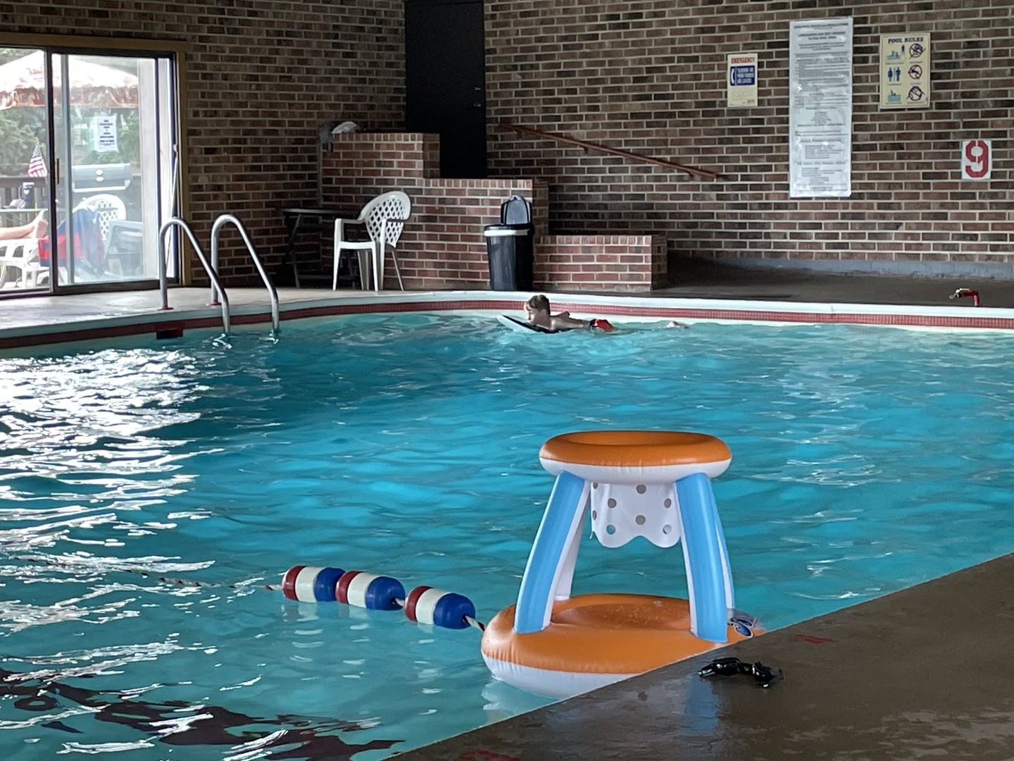 1423 Woodbridge Road, Unit 1E Joliet, IL 60436 - Photo 22 of 30 a backyard of a house with seating space