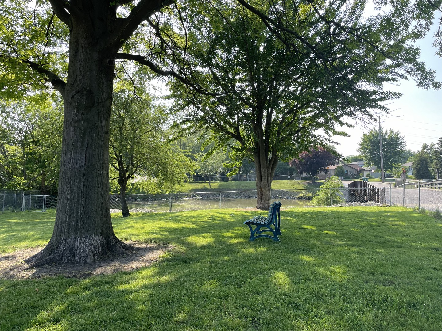 1423 Woodbridge Road, Unit 1E Joliet, IL 60436 - Photo 28 of 30 a view of a garden with a tree