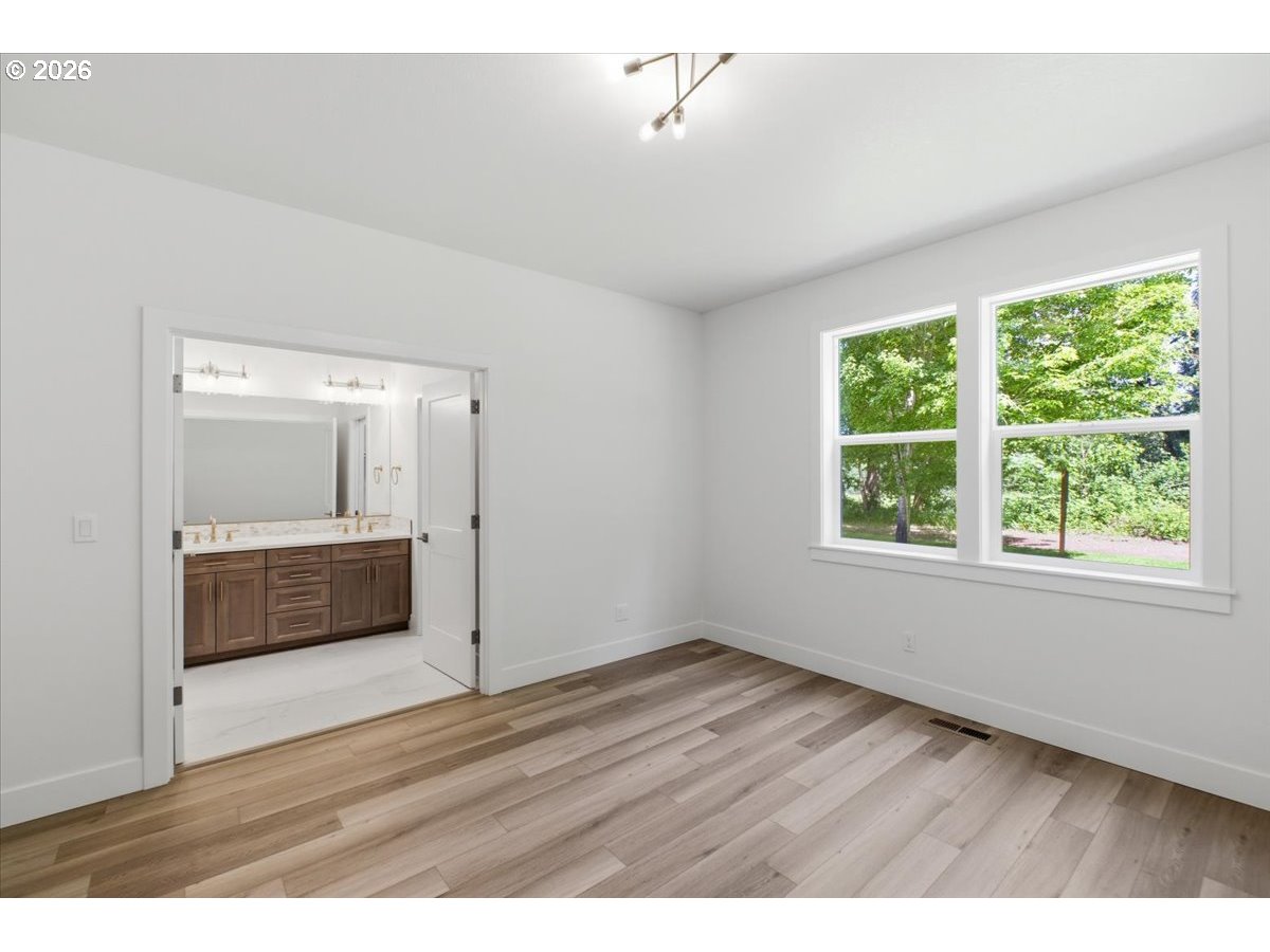 2147 Northeast Spitz Road Canby, OR 97013 - Photo 24 of 48 a view interior of a house and an entryway with wooden floor