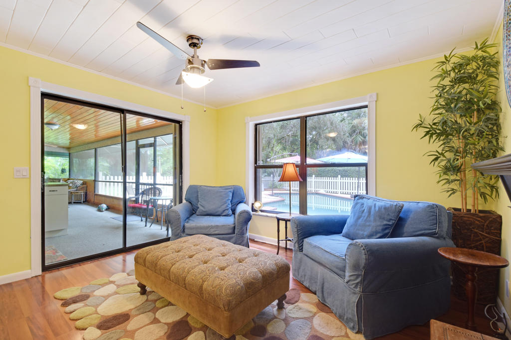 15429 Jupiter Farms Road Jupiter, FL 33478 - Photo 25 of 59 a living room with furniture and a large window