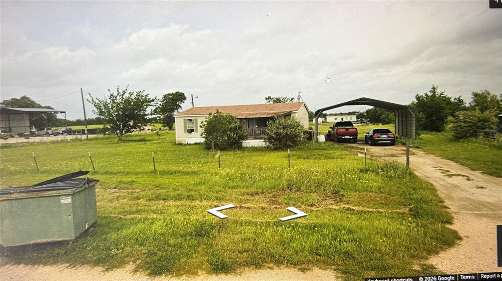5321 Spring Street Alvarado, TX 76009 - Photo 2 of 2 a view of a playground with basketball court