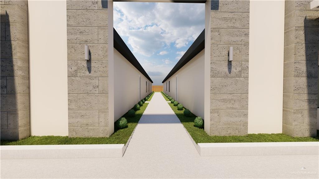 616 Mountain Road, Unit 5A Mission, TX 78573 - Photo 8 of 9 a view of entryway with flower plants
