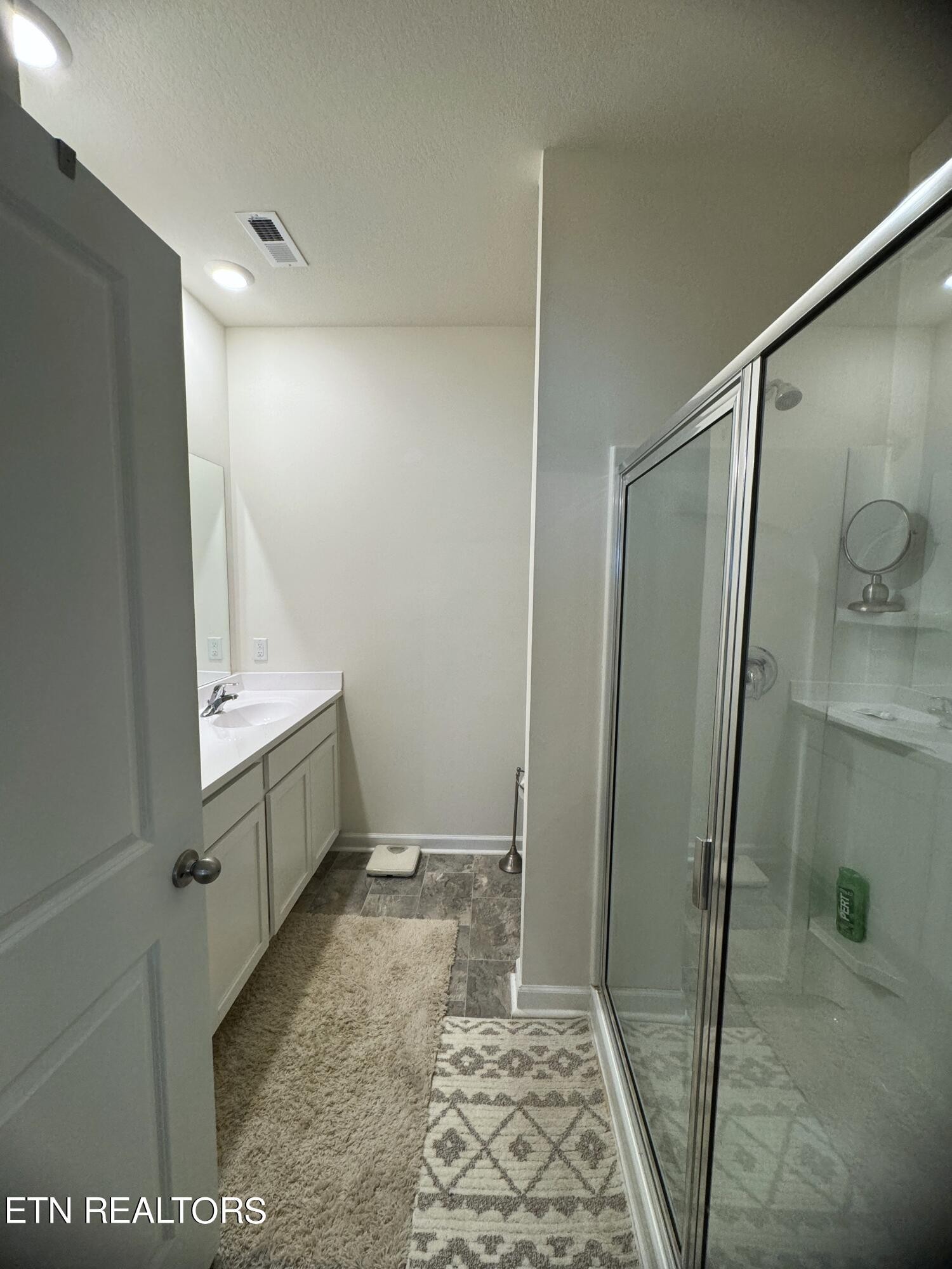 764 North Morelock Road Morristown, TN 37814 - Photo 9 of 18 a bathroom with a sink and mirror