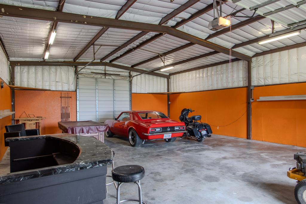 483 Christy Kay Lane Rhome, TX 76078 - Photo 28 of 40 a room with furniture and a chandelier