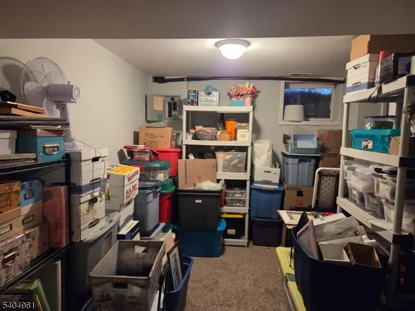 a storage room with storage and utility