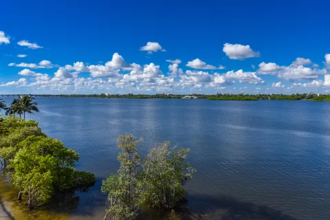 a view of a lake in the back yard