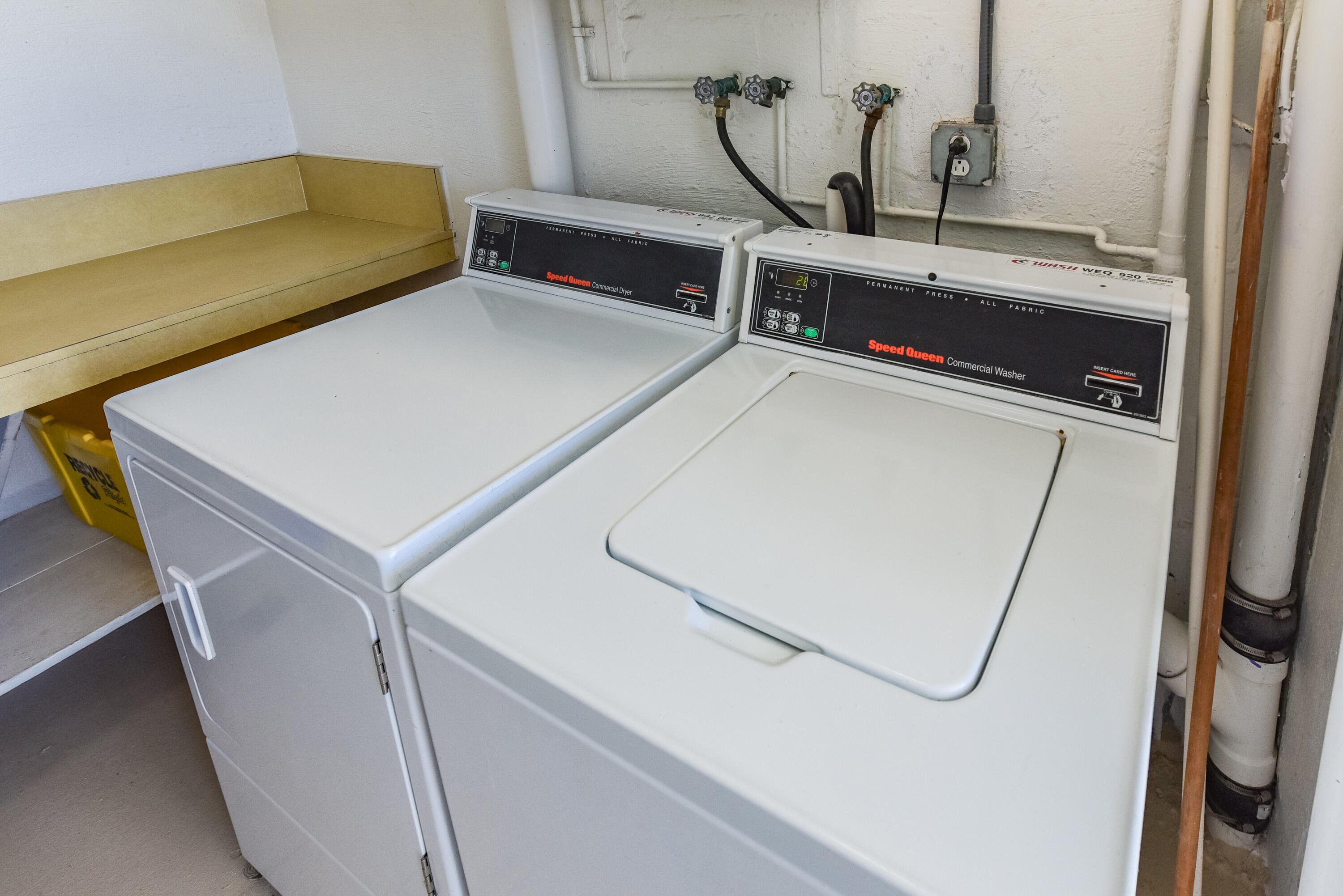 2505 South Ocean Boulevard, Unit 411 Palm Beach, FL 33480 - Photo 23 of 31 a utility room with dryer and washer