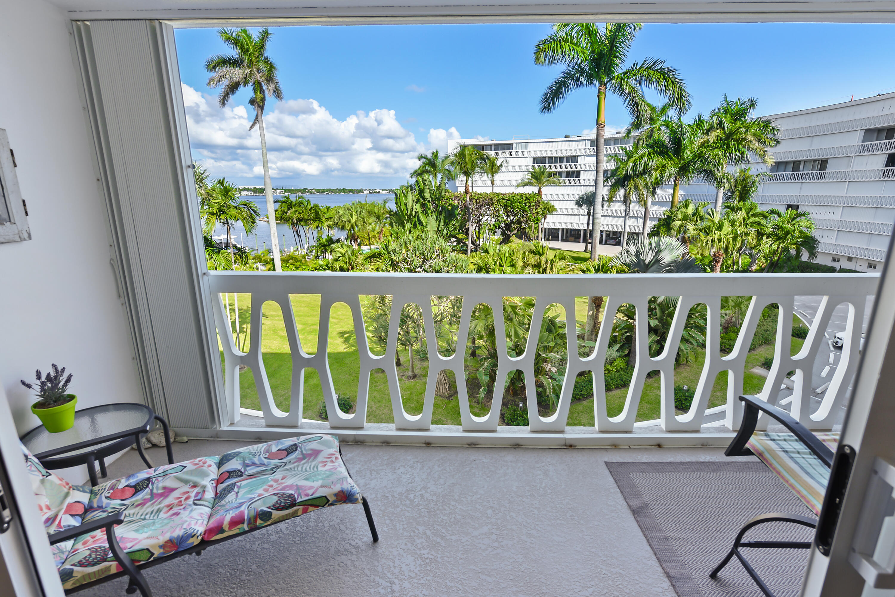 2505 South Ocean Boulevard, Unit 411 Palm Beach, FL 33480 - Photo 4 of 31 a view of a porch with furniture and garden