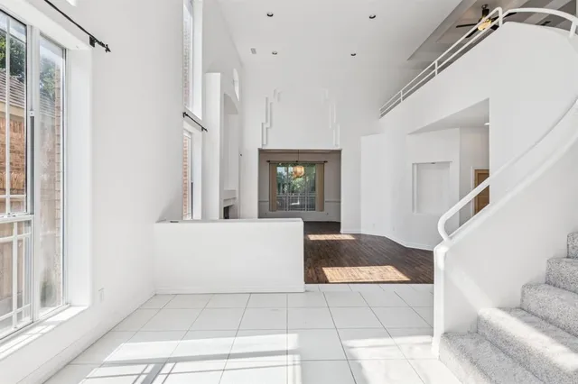 a view of entryway and hall with a couch