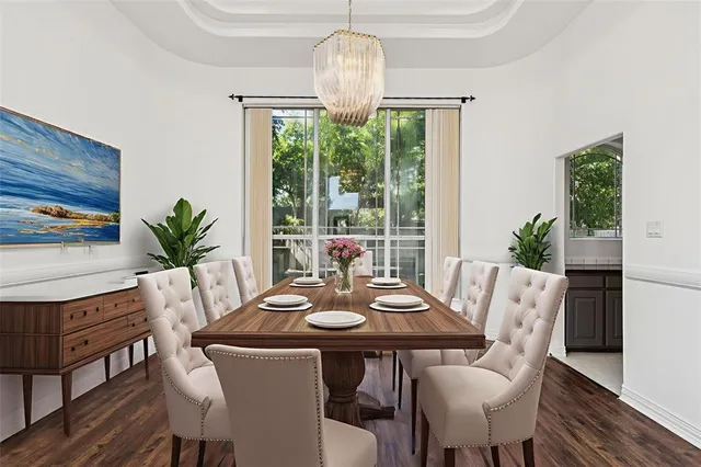 a view of a dining room with furniture window and outside view