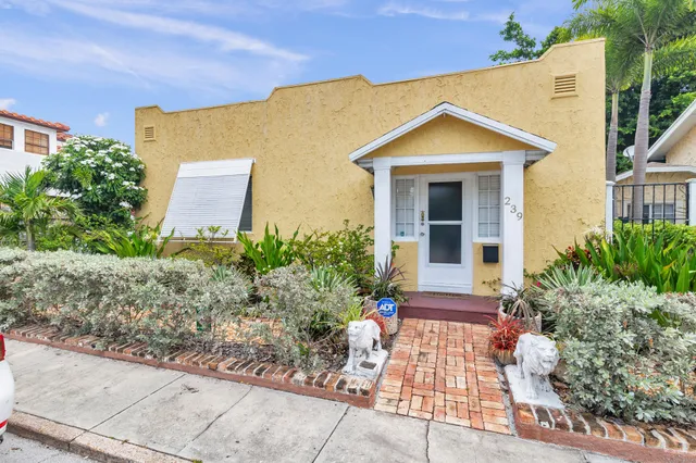 a front view of house with yard