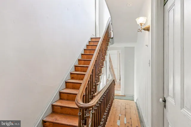 a view of entryway with wooden floor