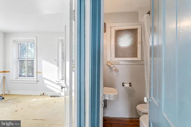 a view of bathroom with a toilet