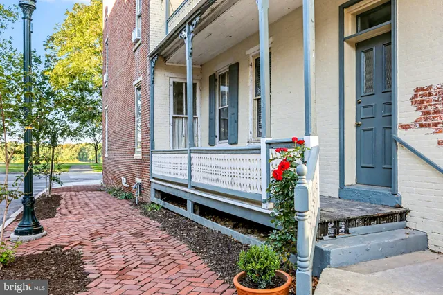 a house view with a garden space